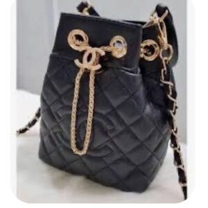 Chanel Quilted Black &Gold complimentary Chanel VIP gift ( Bucket drawstring bag